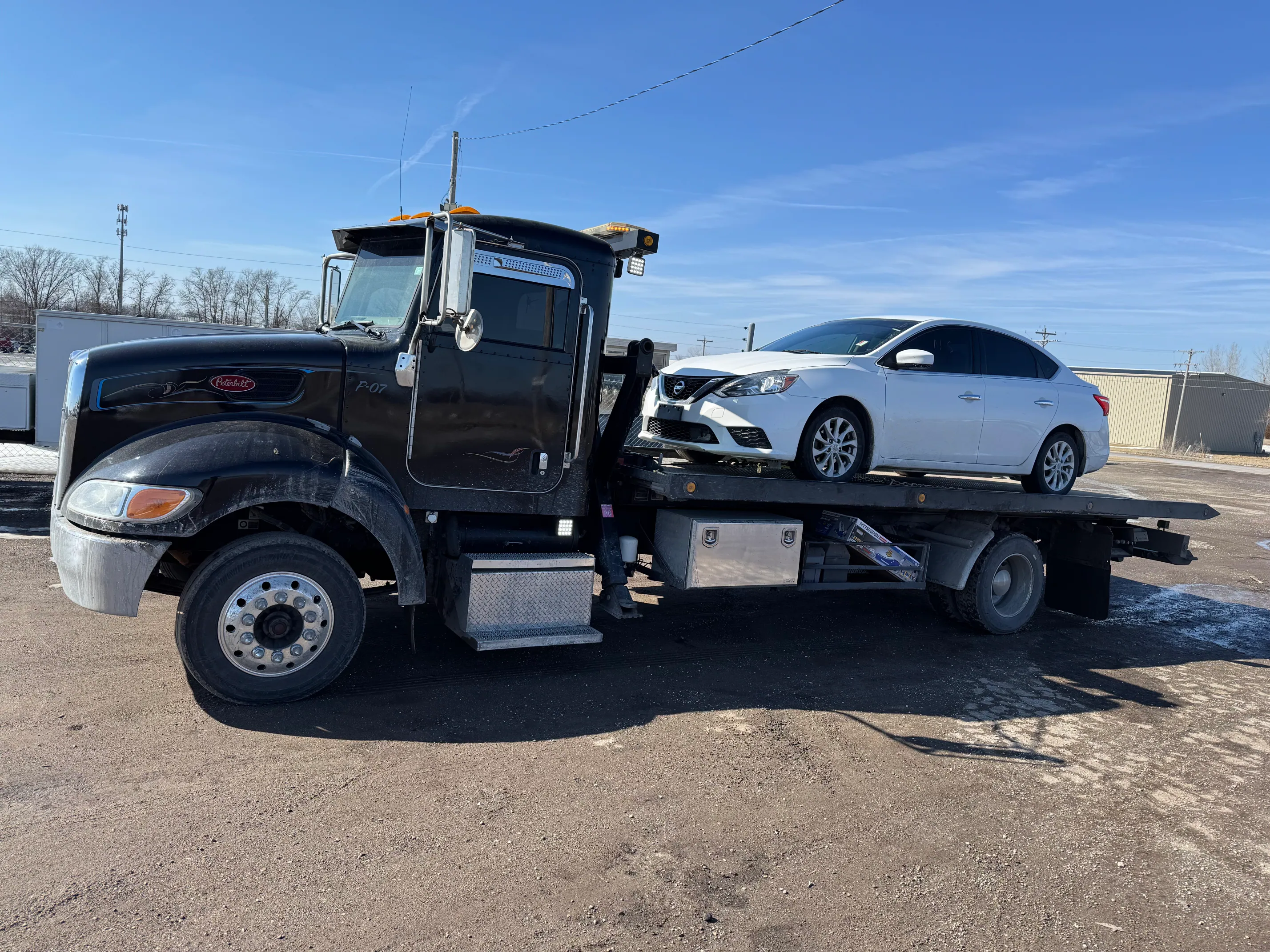 Sedan towed from roadside